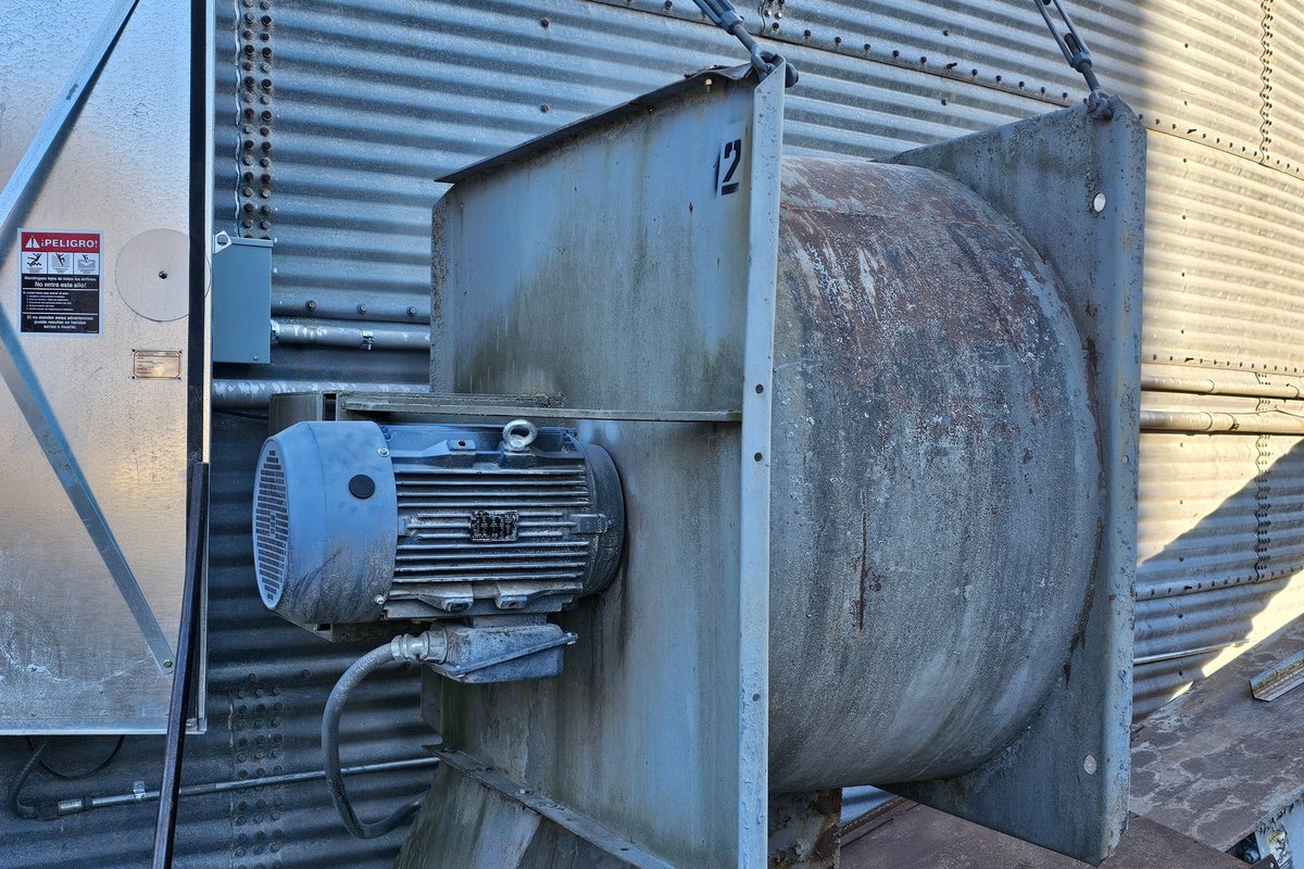 Facility fan motor and material handling equipment